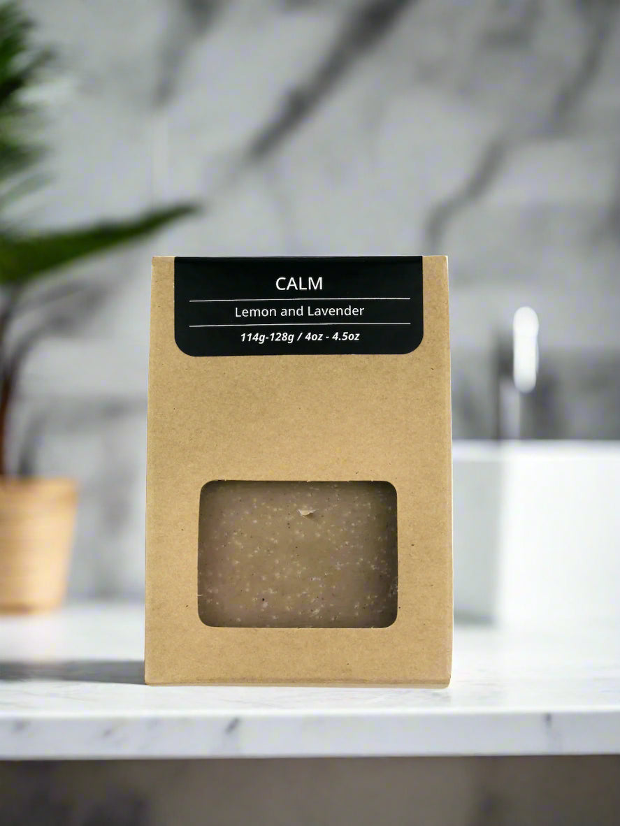 Kraft paper packaging with a window displaying a product labeled 'Calm' on a white background